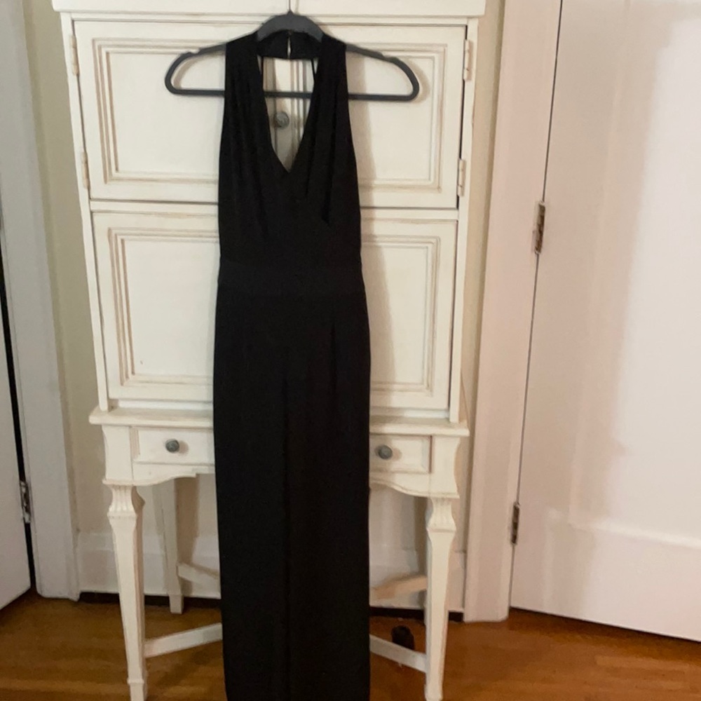 Black jumpsuit by express worn once dress up or down